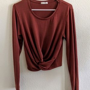 Rustic red long sleeve top with front knot